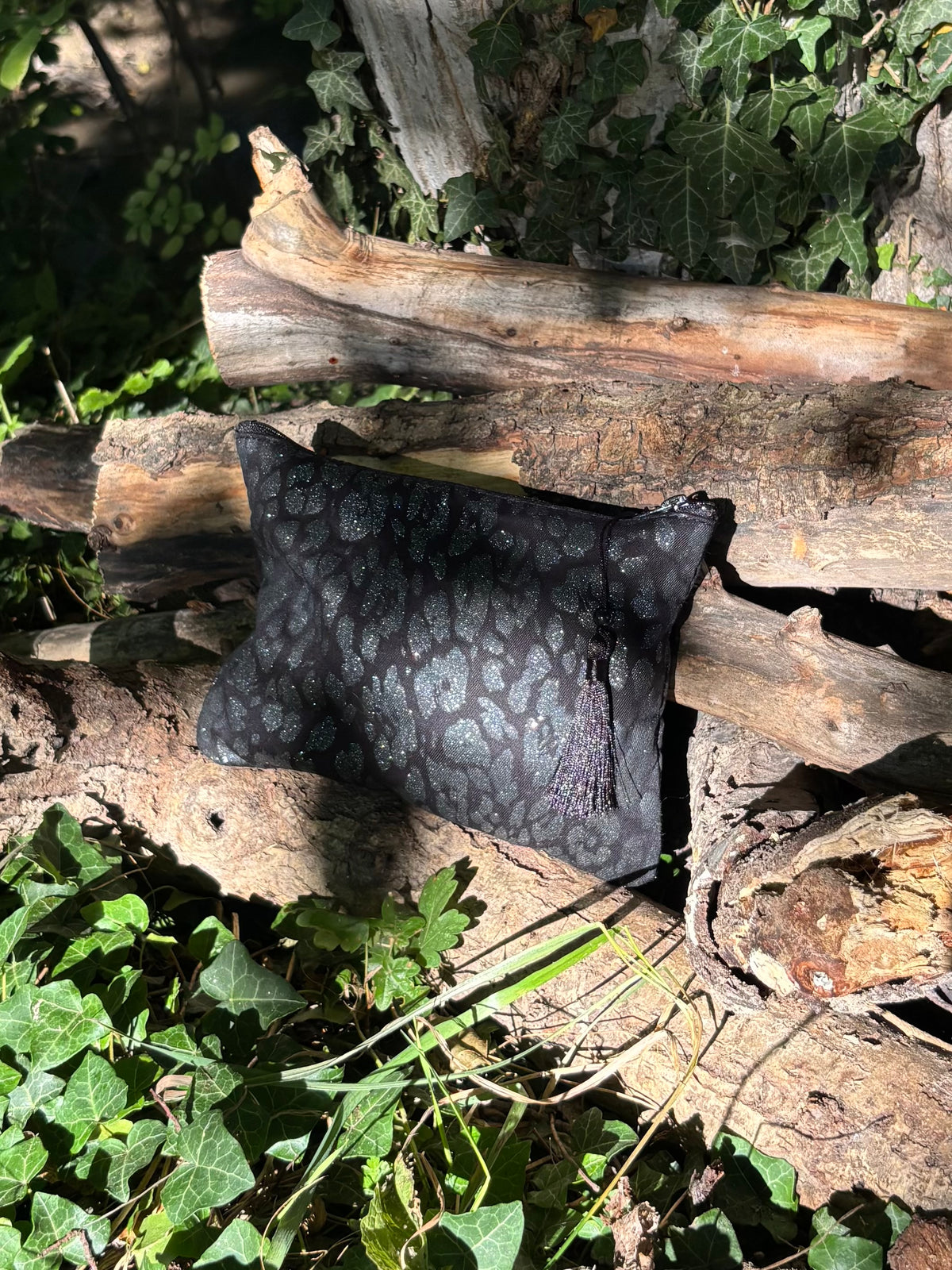 Pochette léopard à motifs argentés