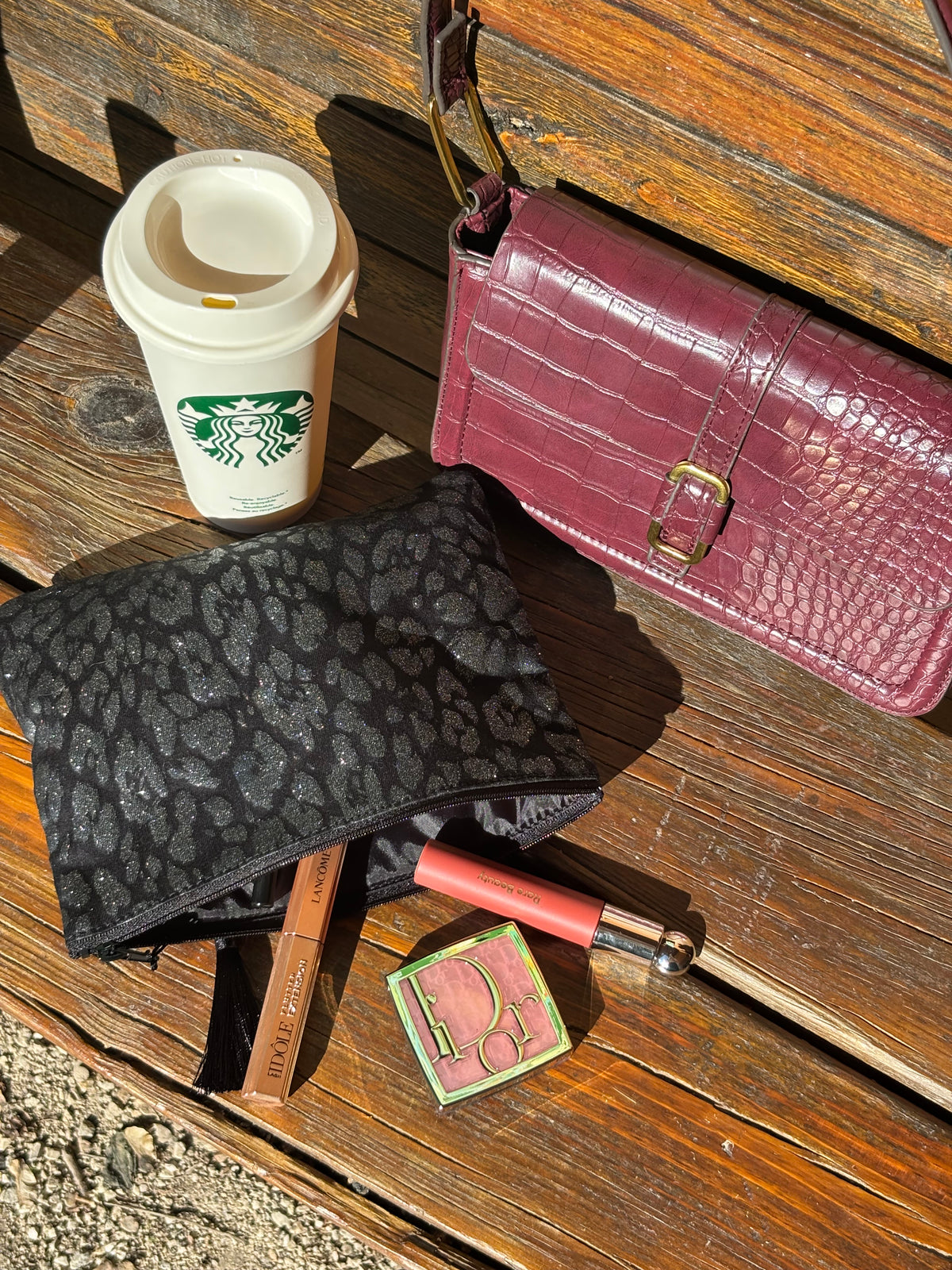 Pochette léopard à motifs argentés